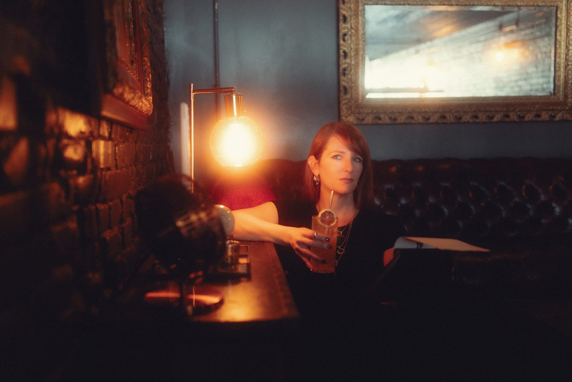 Editor in Chief for Black Market Fiction, Kristin McTiernan in the Kansas City Speakeasy, West Bottoms Whiskey